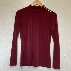 Michael Kors mock turtleneck with gold buttons.